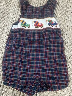 Beaux et Belles New Orleans Smocked Construction Truck Plaid Bubble Romper. 1